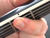 Pressing down near the frets eliminates the possibility of fret-buzz